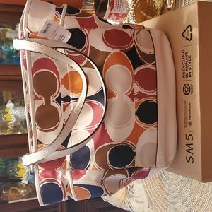 Coach bag very  beautiful.  multiple  colors.